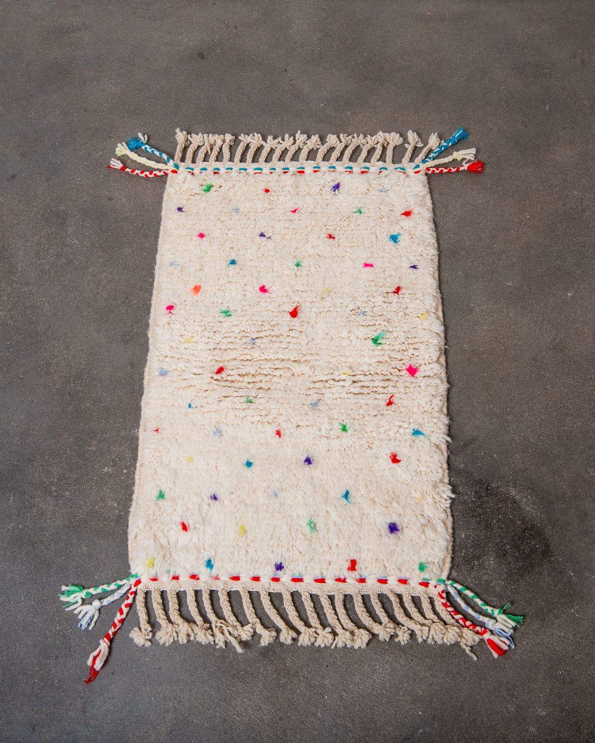 Modern, designer, handcrafted Berber rug from Morocco. Beniourain carpet with beautiful colours and patterns and fluffy wool texture.